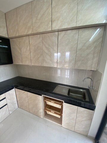Kitchen in 2 BHK Apartment at Shapoorji Pallonji Sensorium, Hinjewadi – for Rent