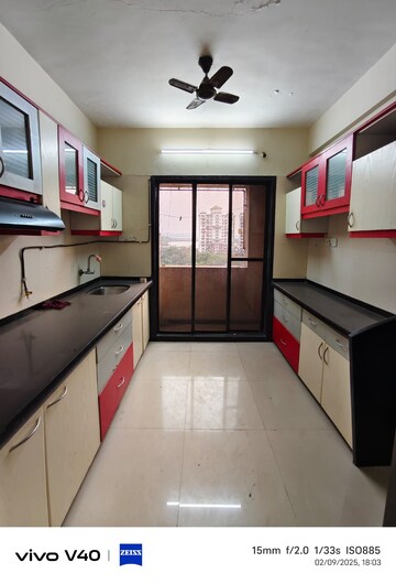Kitchen in 2 BHK Apartment at Akshar Shreeji Heights, Seawoods – for Sale