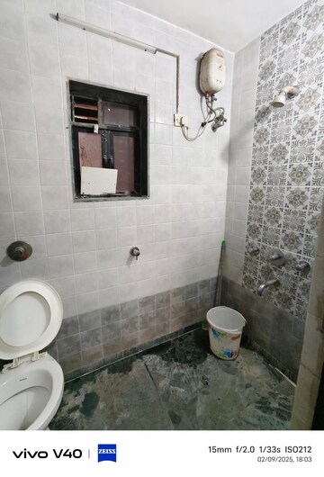 Bathroom in 2 BHK Apartment at Akshar Shreeji Heights, Seawoods – for Sale