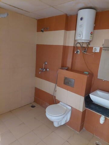 Bathroom in 3 BHK Apartment at Mahagun Mywoods, Sector 16c Greater Noida – for Rent