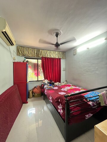 Bedroom in 1 BHK Apartment at Tirupati CHS Nerul, Nerul – for Sale