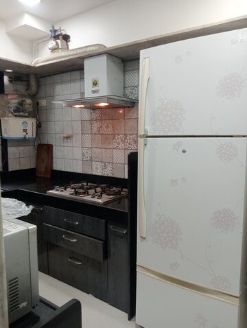 Kitchen in 1 BHK Apartment at Om Gokul Nagari CHS, Kandivali East – for Rent
