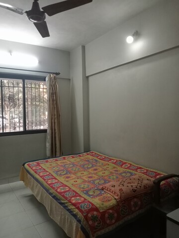 Bedroom in 2 BHK Apartment at Om Gokul Nagari CHS, Kandivali East – for Rent