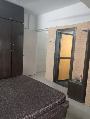 Bedroom in 1 BHK Apartment at Mahudi Darshan, Kandivali East – for Rent