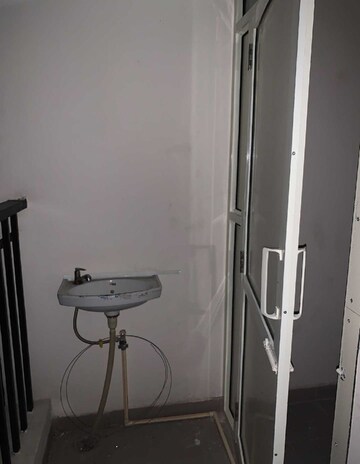 Bathroom in 2 BHK Apartment at Paradigm Business Hermitage Park, Dhakoli Village – for Rent