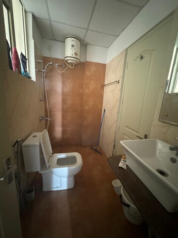 Bathroom in 3 BHK Apartment at Sushma Elite Cross, Dhakoli Village – for Rent