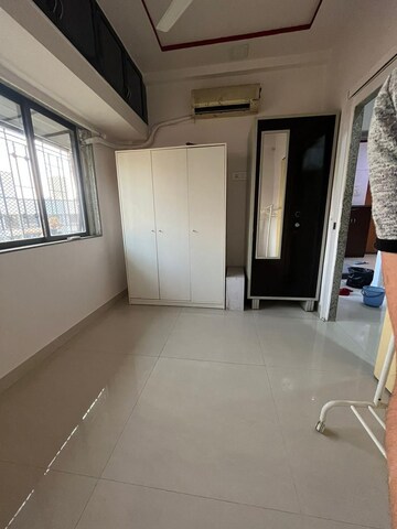 Building Lobby in 2 BHK Apartment at Patliputra Building, Andheri West – for Sale