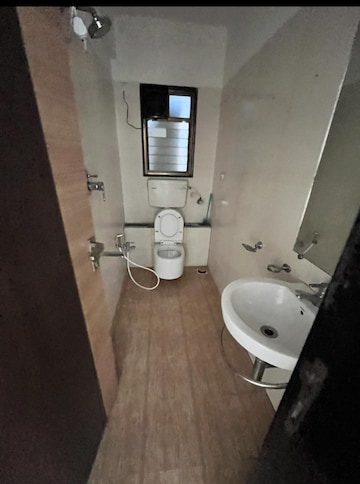 Bathroom in 2 BHK Apartment at Rajdeep CHS Naupada, Naupada – for Rent
