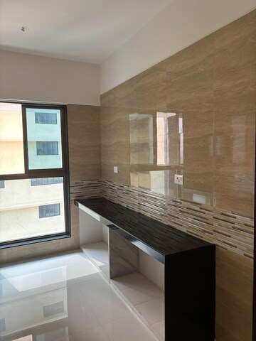 Kitchen in 2 BHK Apartment at Sheth Irene, Malad West – for Sale
