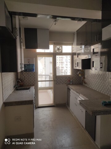 Kitchen in 2 BHK Apartment at Supertech Czar Suites, Omicron I Greater Noida – for Rent
