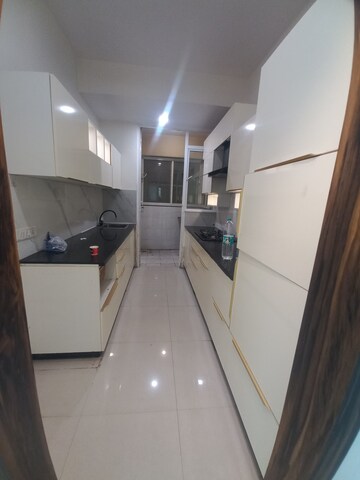 Kitchen in 2 BHK Apartment at Elite Golf Green, Sector 79 – for Sale