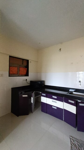 Kitchen in 1 BHK Apartment at Matoshree Pride, Parel – for Rent