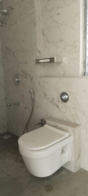 Bathroom in 3 BHK Apartment at New Happy Life CHS, Mulund West – for Sale