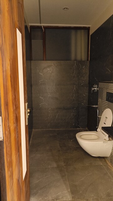Bathroom in 3 BHK Apartment at Raja Park – for Rent