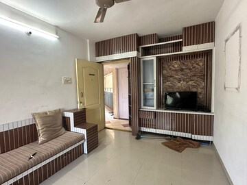 Living Room in 1 BHK Apartment at Tyagi Uttam Plaza, Kharadi – for Rent