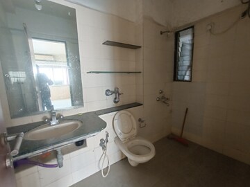 Bathroom in 3 BHK Apartment at Vanashree CHS, Seawoods – for Rent