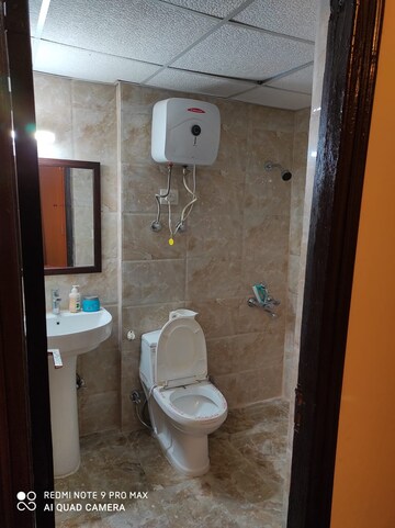 Bathroom in Studio Apartment at Supertech Czar Suites, Omicron I Greater Noida – for Rent