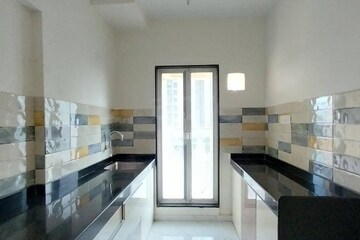 Kitchen in 1 BHK Apartment at Siddhi Highland Haven, Balkum Pada – for Rent