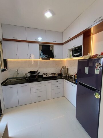 Kitchen in 2 BHK Apartment at Ravinanda Trinity, Wagholi – for Sale
