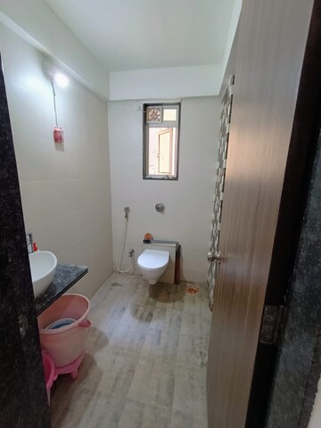 Bathroom in 2 BHK Apartment at Ravinanda Trinity, Wagholi – for Sale