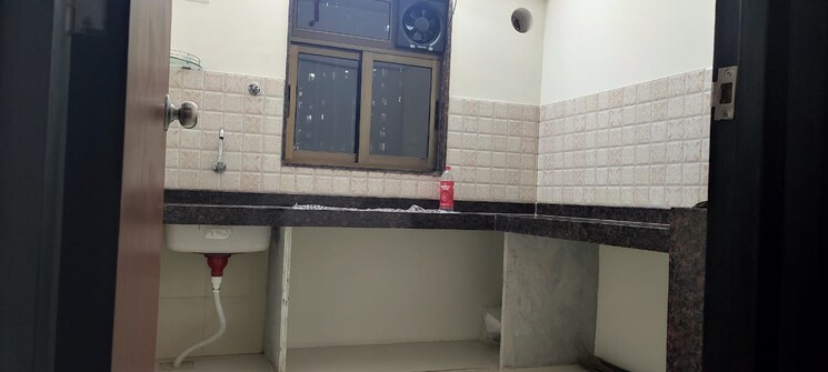 Kitchen, dosti-planet-north 1 Bedroom 640 Sq.Ft. Apartment In Shilphata Thane 8181590