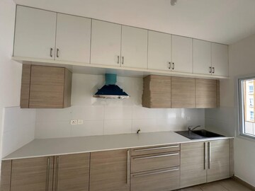 Kitchen in 2 BHK Apartment at Bhartiya Nikoo Homes, Thanisandra Main Road – for Rent
