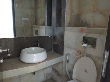 Bathroom in 3 BHK Apartment at Transcon Flora Heights, Andheri West – for Sale