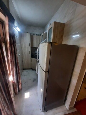 Kitchen in 2 BHK Builder Floor at Freedom Fighters Enclave – for Rent