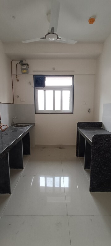 Kitchen in 2 BHK Apartment at Ashar Axis, Majiwada – for Rent