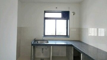 Kitchen in 1 BHK Apartment at Runwal Eirene, Balkum Pada – for Sale