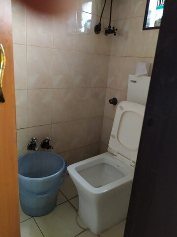 Bathroom in 2 BHK Apartment at Anushka CHS, Andheri West – for Rent