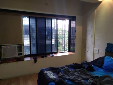 Bedroom in 2 BHK Apartment at Anushka CHS, Andheri West – for Rent