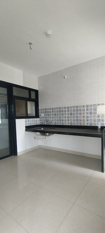 Kitchen in 2 BHK Apartment at Nanded City Pancham, Nanded – for Rent
