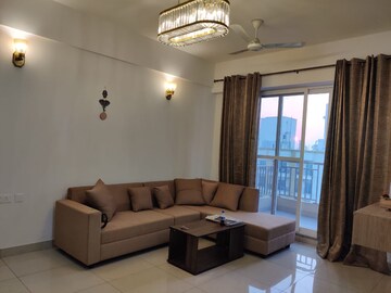 Living Room in 2 BHK Apartment at Aims Golf City, Sector 75 – for Rent