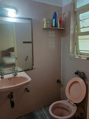 Bathroom in 2 BHK Apartment at Horizon CHS, Andheri West – for Sale
