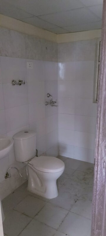 Bathroom in 3 BHK Apartment at Aims Golf City, Sector 75 – for Rent