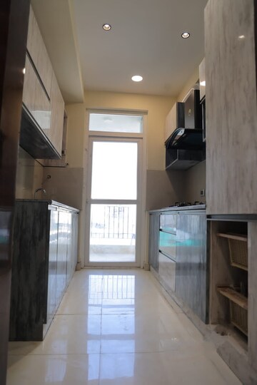 Kitchen in 3 BHK Penthouse at Ansals Sushant City – for Sale