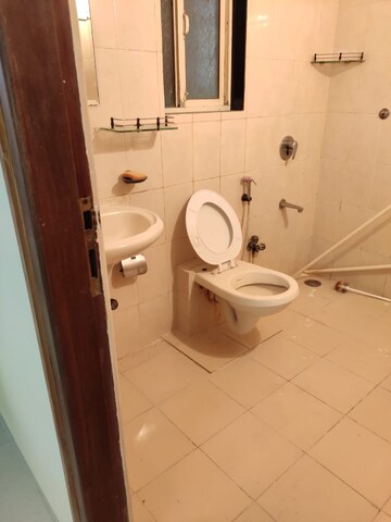 Bathroom in 2 BHK Apartment at Thakur Badrinath Tower, Andheri West – for Sale
