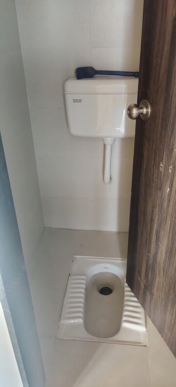 Bathroom in 1 BHK Apartment at Rohit Pinnacle, Thergaon – for Sale