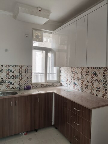 Kitchen in 3 BHK Apartment at Amrapali Leisure Park, Amrapali Leisure Valley – for Rent