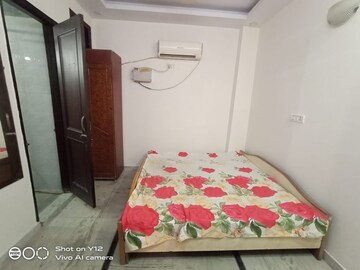 Bedroom in 2 BHK Builder Floor at East Of Kailash – for Rent