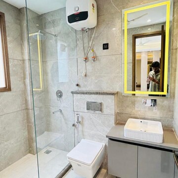 Bathroom in 4 BHK Builder Floor at Ansal API Esencia, Sector 67 – for Sale