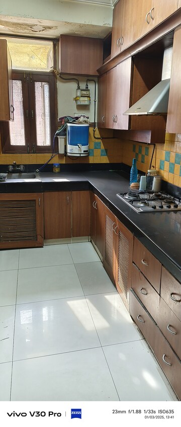 Kitchen in 3 BHK Apartment at Vasundhara Enclave – for Rent