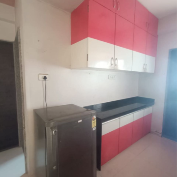 Kitchen in 2 BHK Apartment at Shakti 140, Sg Highway – for Rent