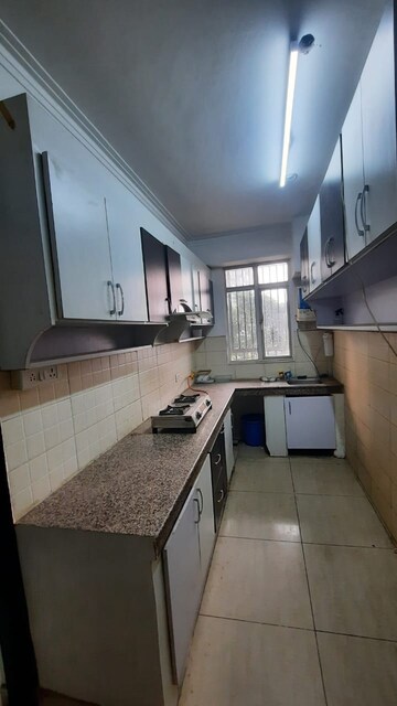 Kitchen in 3 BHK Apartment at Jaipurias Sunrise Greens, Ahinsa Khand 1 – for Rent