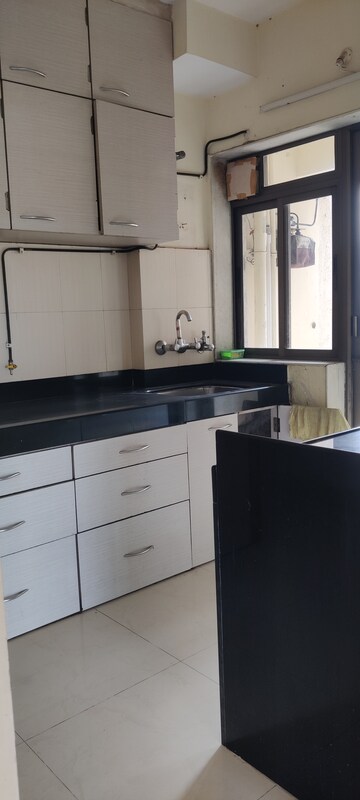 Kitchen in 2 BHK Apartment at Sunil Nivas Society, Andheri West – for Rent