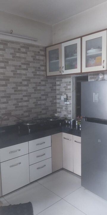 Kitchen in 2 BHK Apartment at Sahaj Solarium, Vasna – for Rent