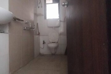 Bathroom in 1.5 BHK Apartment at Runwal Garden City, Balkum Pada – for Rent
