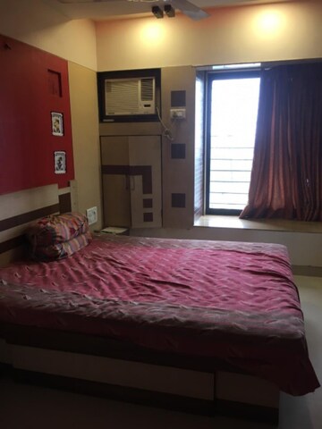 Bedroom in 2 BHK Apartment at Ashish Swapnalok Towers, Goregaon East – for Rent