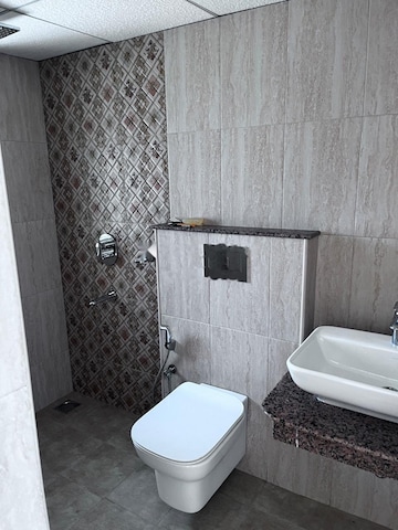 Bathroom in 2.5 BHK Apartment at Kolte Patil iTowers Exente, Electronic City Phase I – for Rent